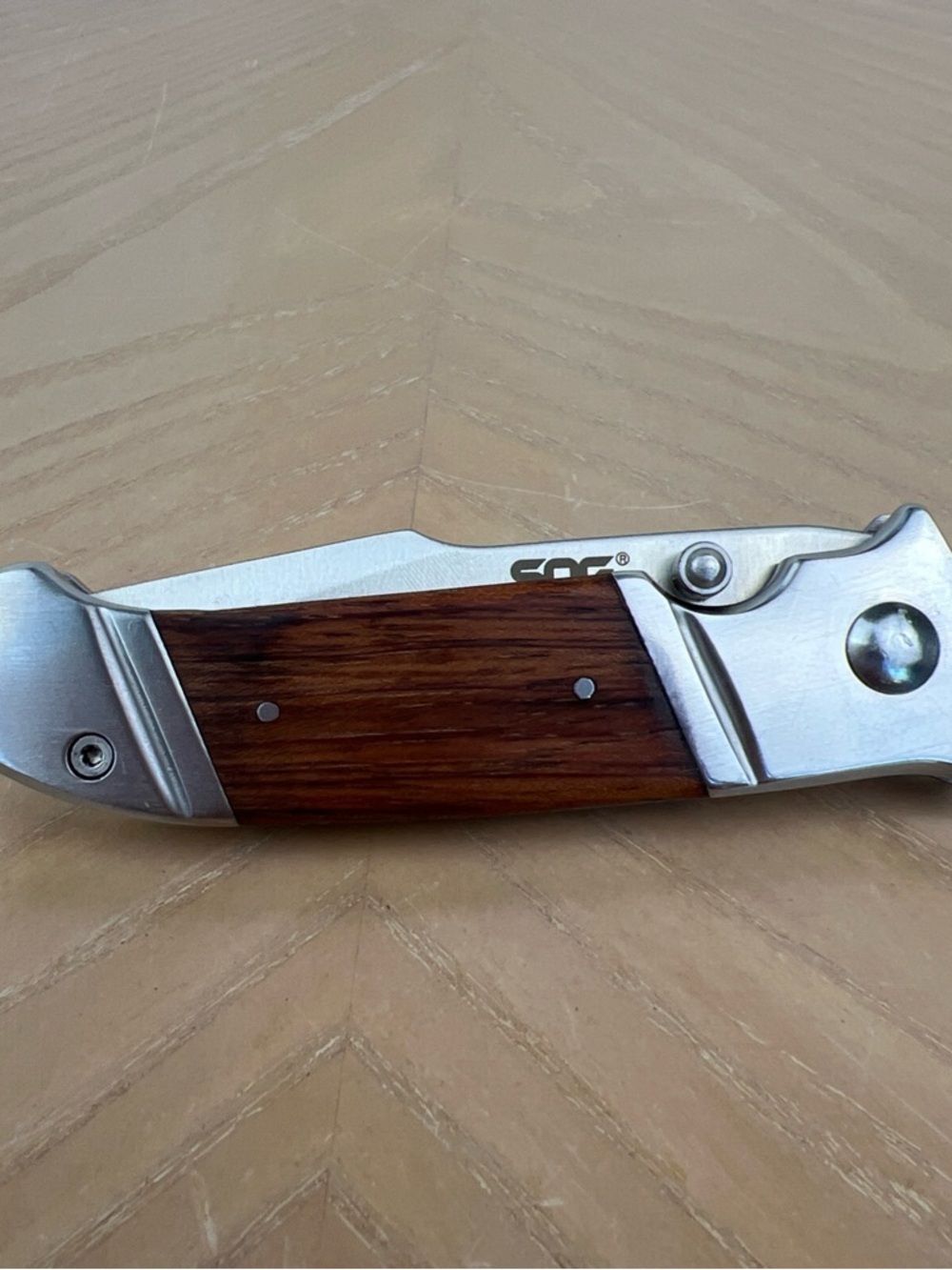 SOG Folding Pocket Knife with Silver Metal and Brown Wood Handle